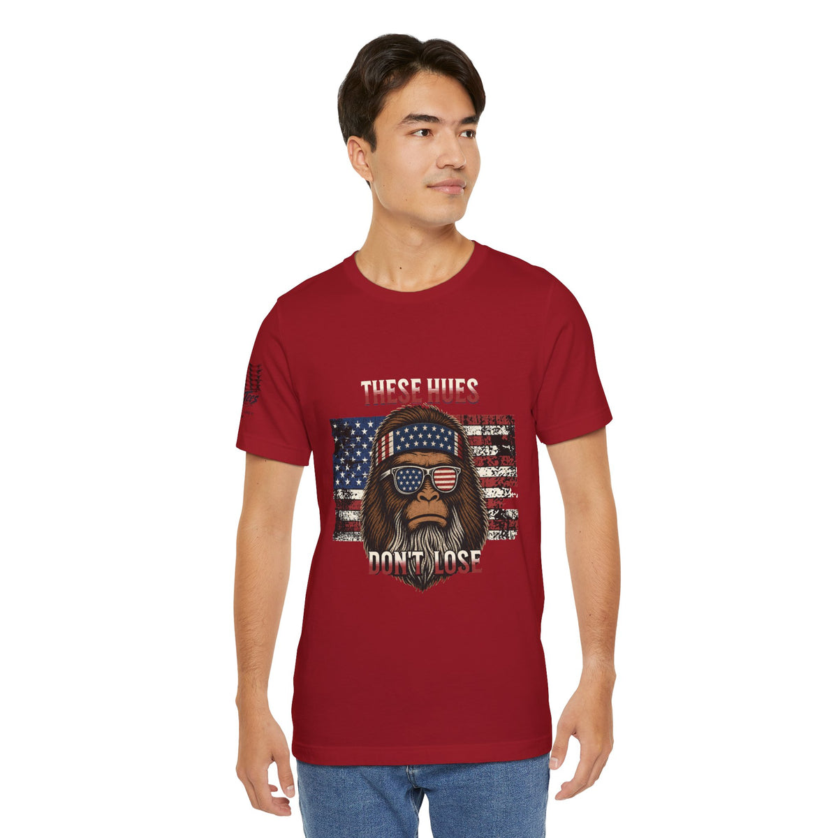 These Hues Don't Lose — Bigfoot American Flag Tee