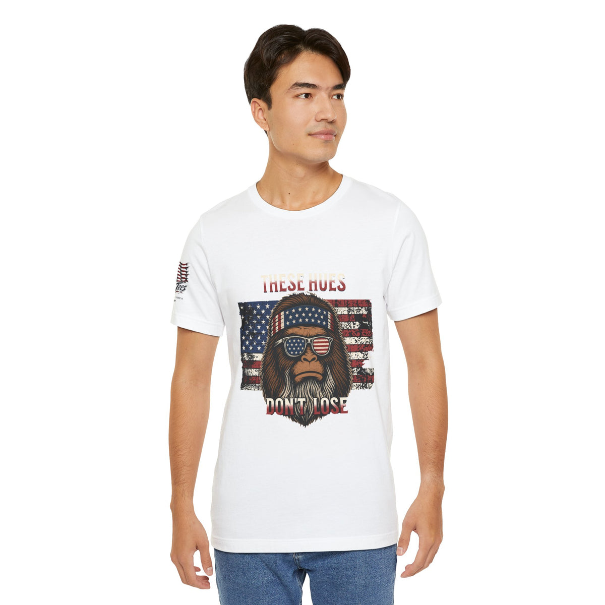 These Hues Don't Lose — Bigfoot American Flag Tee