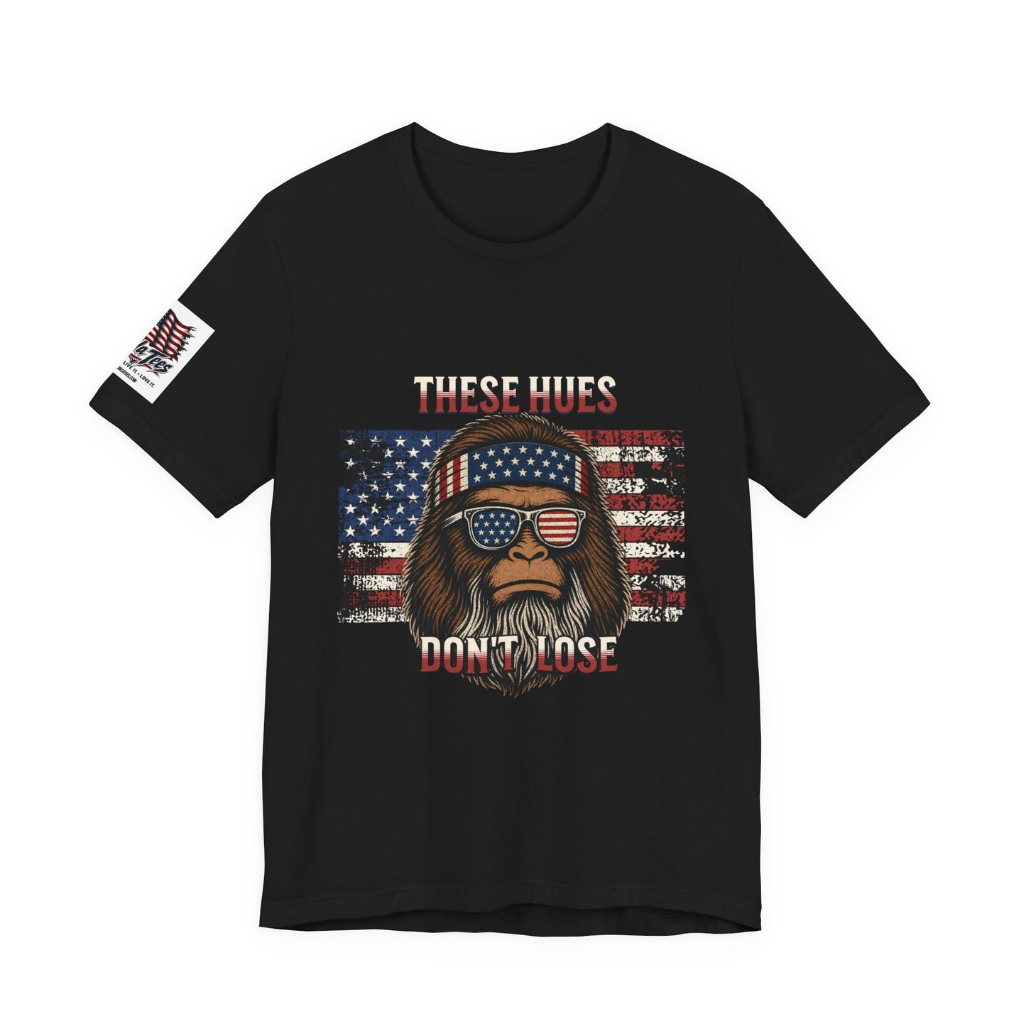 These Hues Don't Lose — Bigfoot American Flag Tee